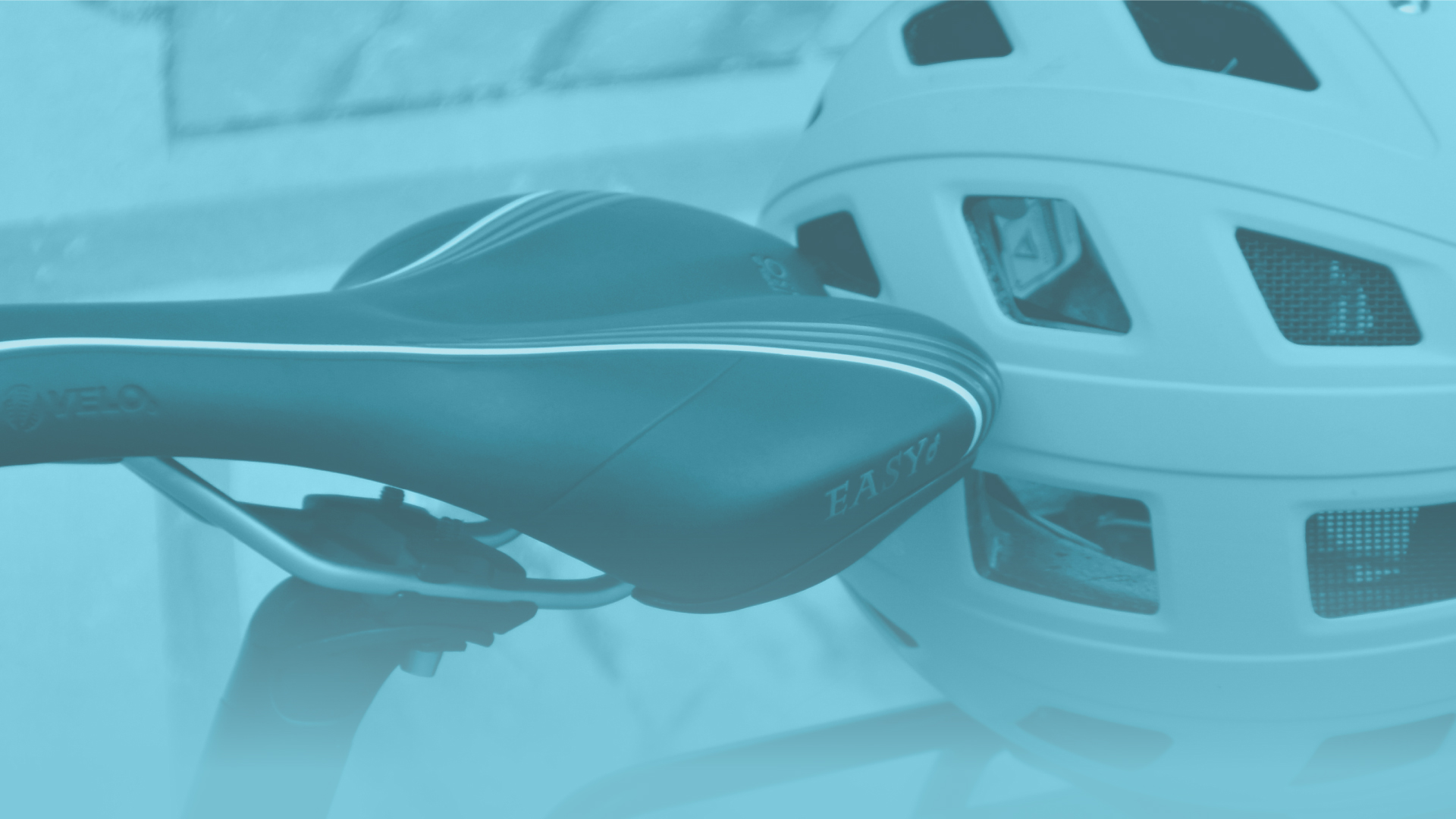 Abstract image of a bike seat and helmet.