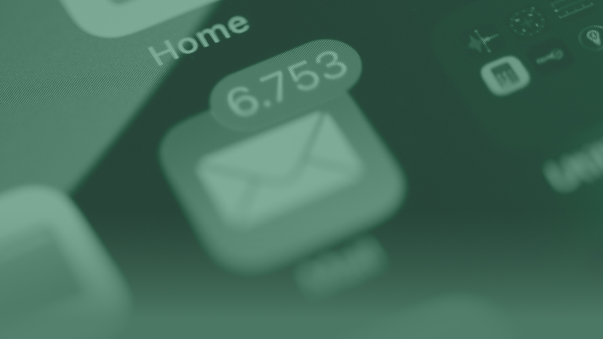 Abstract image of screen showing the mail app with 6753 notifications.