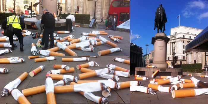 Photographs of Cigarette Butts on Ground in London