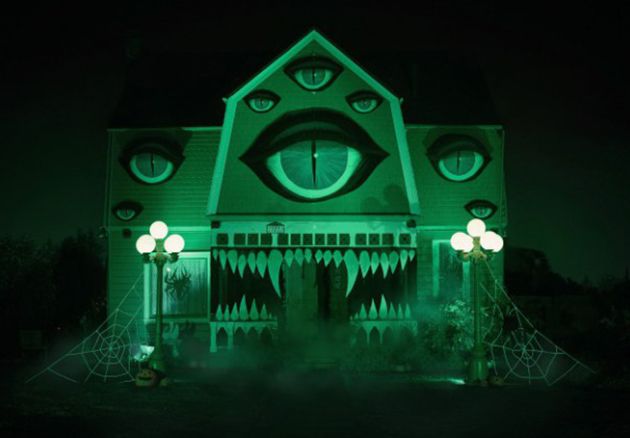 Photograph of Halloween Decorated House illuminated at night time
