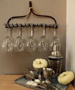 Photograph of Garden Rake Being Used as Wine Glass Rack