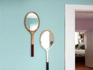 Photograph of Tennis Rackets being Used as Wall Mirrors