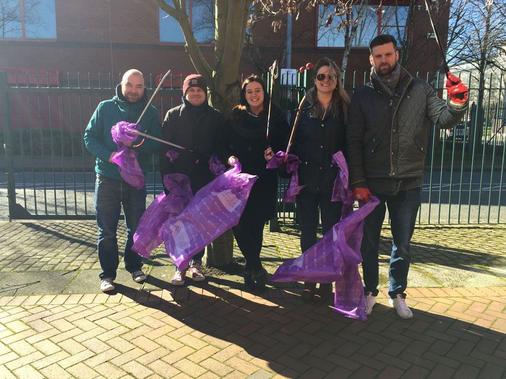 Photograph of Team Carbon on a litter pick in Salford