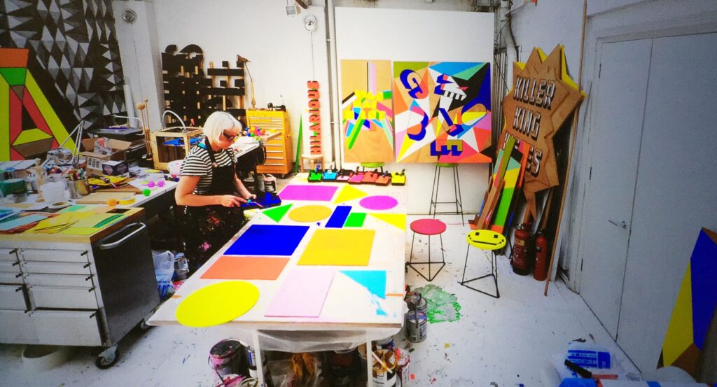 Photograph of woman working in design studio