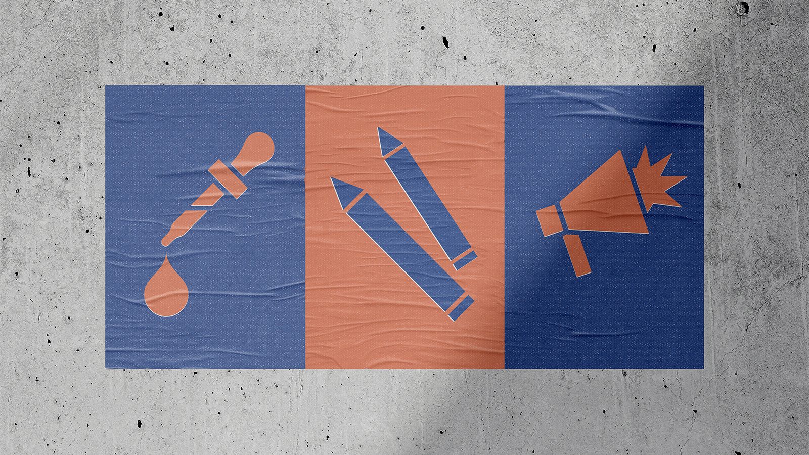 Posters on a concrete wall.