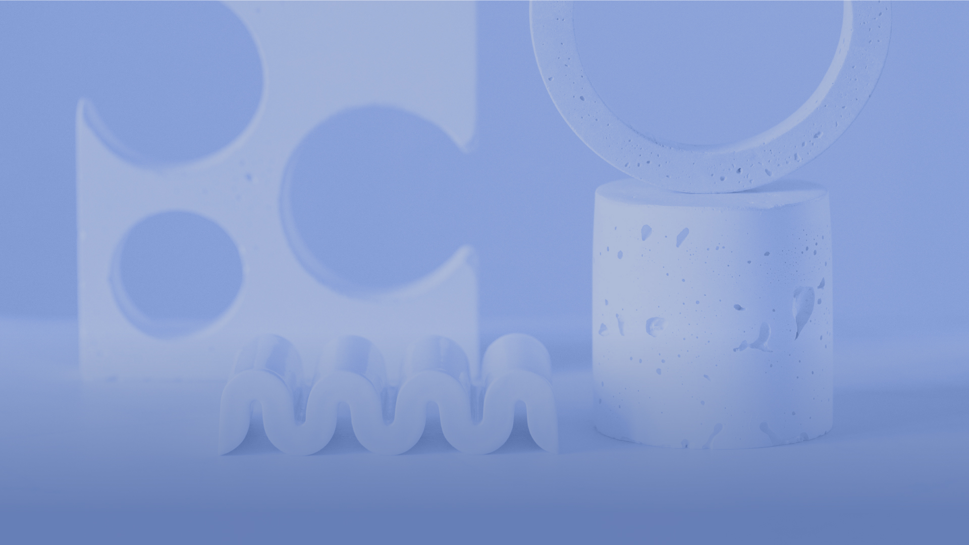 Abstract image of 3D shapes on blue background.